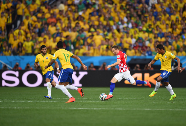 SAO PAULO, BRAZIL - JUNE 12: Luka Modric of Croatia in action during the 2014 FIFA World Cup Brazil Group A match between Brazil and Croatia at Arena de Sao Paulo on June 12, 2014 in Sao Paulo, Brazil. (Photo by Christopher Lee/Getty Images for Sony)